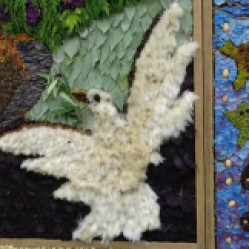 Hathersage close up of the dove on the well dressing